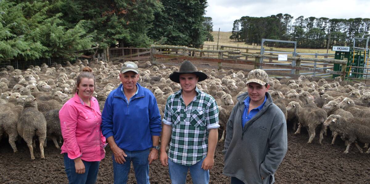 Chelsea Kimber, with Lionel, Andrew and Daniel Platts, "Allawah", Bombala, with their pen of 435 four and half year Merino ewes, Dungaree-blood, August shorn, Gudair vaccinated and NSM sold for $178, to a local producer.