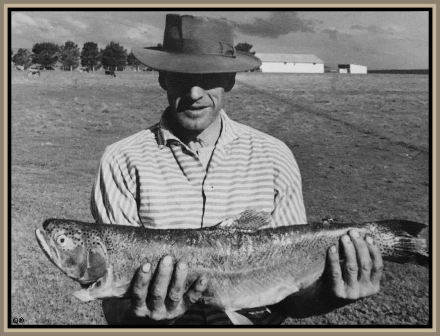 Ernie Smith holds a lovely rainbow trout in this photo believed to be taken in the 1960s or '70s at Gunningrah.