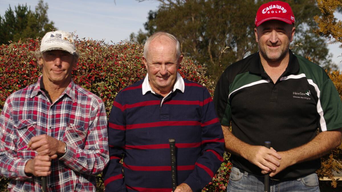 Ray Fermor, Pepper Thompson and Glen Hampshire prepare to tee off at Bombala over the weekend.