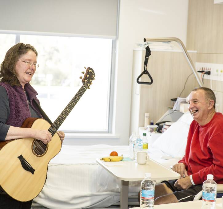 CONNECTION: Kerrie Davies and Ross Beattie experience the combination of music and health at Forbes Hospital. Photo: Kim Storey