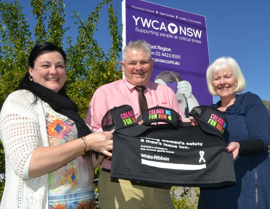 White Ribbon Shoalhaven advocate Kate Campbell, Colour Me Fun Run organiser Mark Stewart and acting manager of the Domestic Violence Team YWCA NSW Sue Davies launch this year’s event.