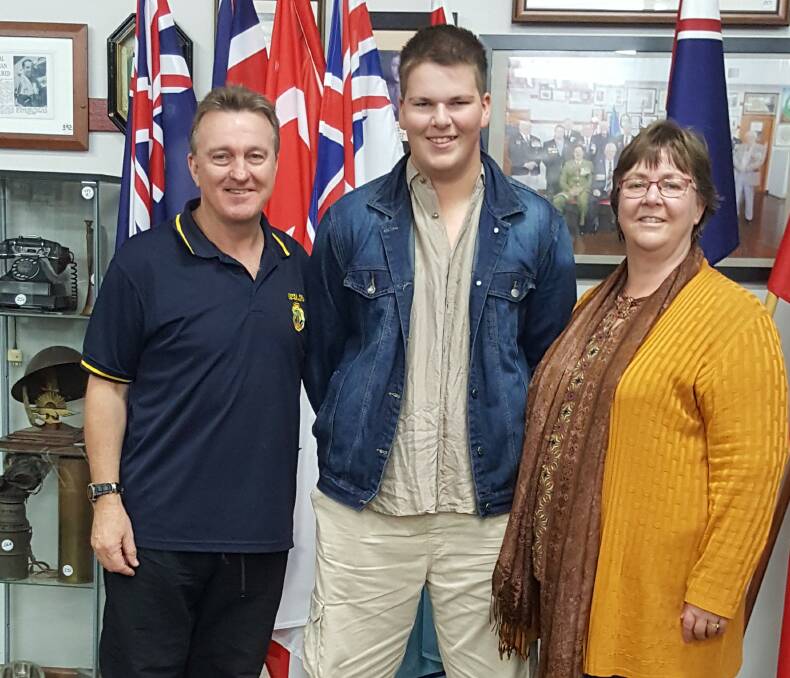 Nowra RSL Sub-Branch secretary Rick Meehan with Kane’s Kokoda Challenge Foundation recipient Andrew Taylor and his mother Sue.