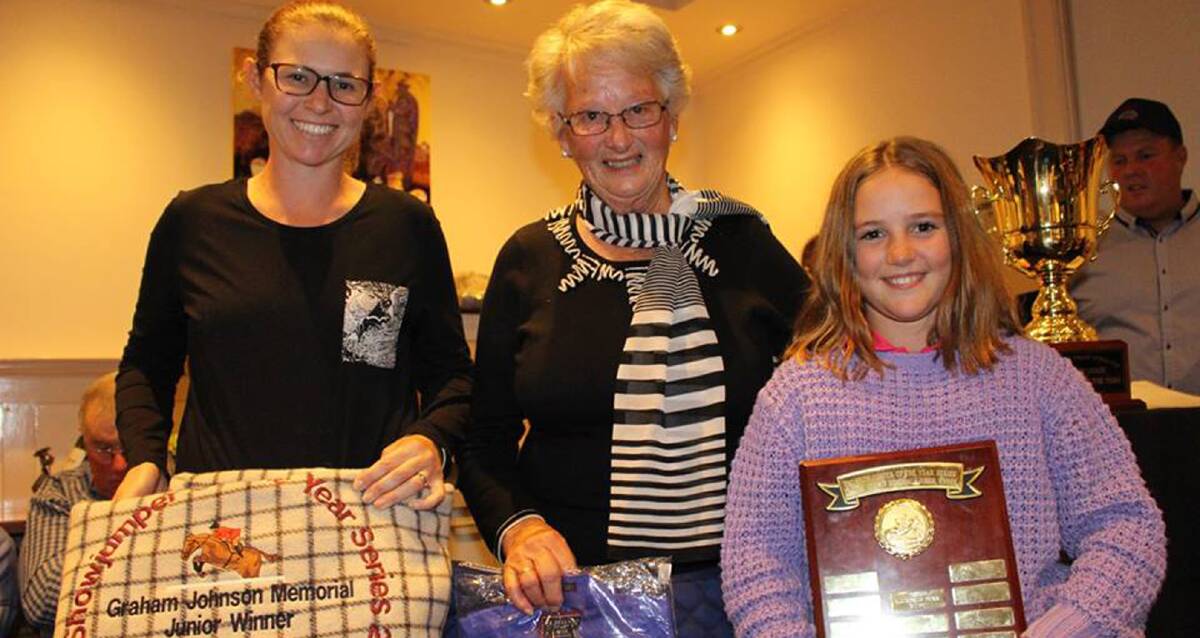 Top of the table: Kirsty McPaul and Helen Slater congratulate junior showjumper of the year Mackenzie Dunn from Delegate.