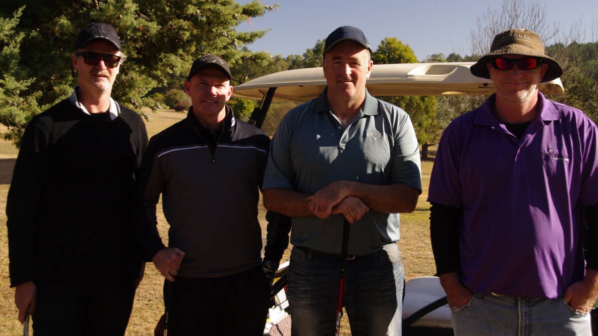 Lee hallam, Nick Townsin, Glen Hampshire and Brad Tonks preparing for a game of golf in the Bombala Men's Open Tournament on Sunday.