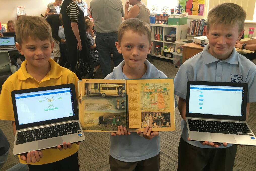 TECH SAVVY:  St Joseph's Bombala students Arlen Hillyer, Kurt Chaplin and Jay Voveris have been researching their family history.