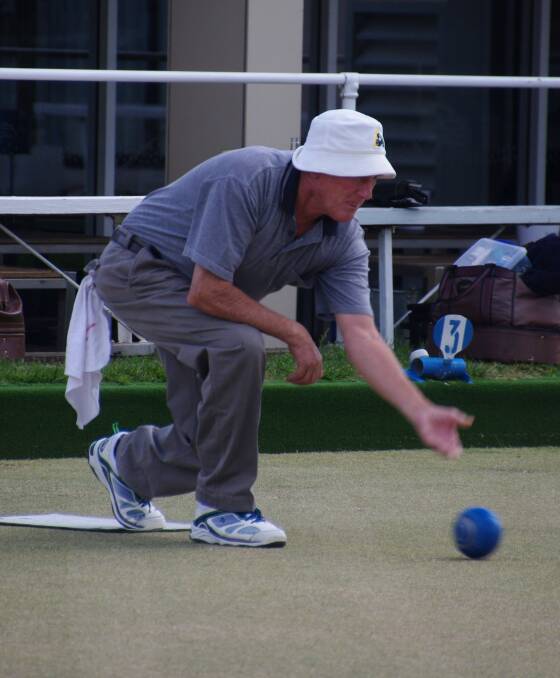 Bombala bowler Athol Dent lays down another good bowl during a weekend game of bowls at the Bombala RSL Club.