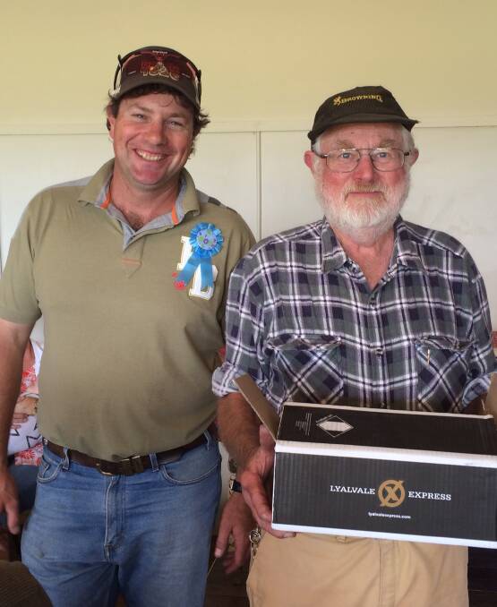 COOMA SHOOT:   At Cooma Gun Club's monthly Down The Line shoot a the overall High Gun winner on the day Steve McIntyre with club president James Barron.