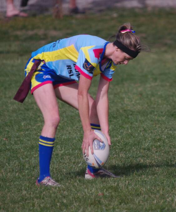Captain coach of the Bombala High Heelers, Patrice Clear makes a play during the women's League Tag game against Eden.
