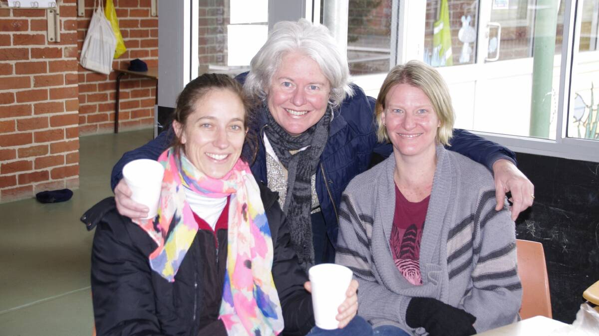 Enjoying a hot cuppa while voting at the Snowy Monaro Regional council elections in Delegate on Saturday were Kristy Brook, Jen Jeffreys and Andrea Mitchell.