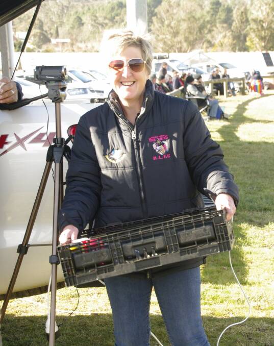 Sue Morgan doling a great job feeding the volunteers at the rugby league football games in Bombala on Sunday.