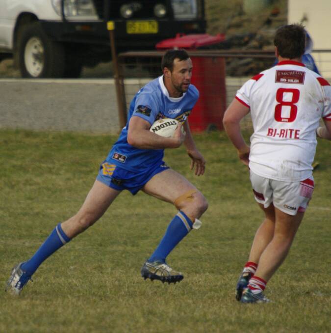 Bombala Blue Heeler Malcolm Stone makes a dash for the try line during Saturday's rugby league game against Eden.