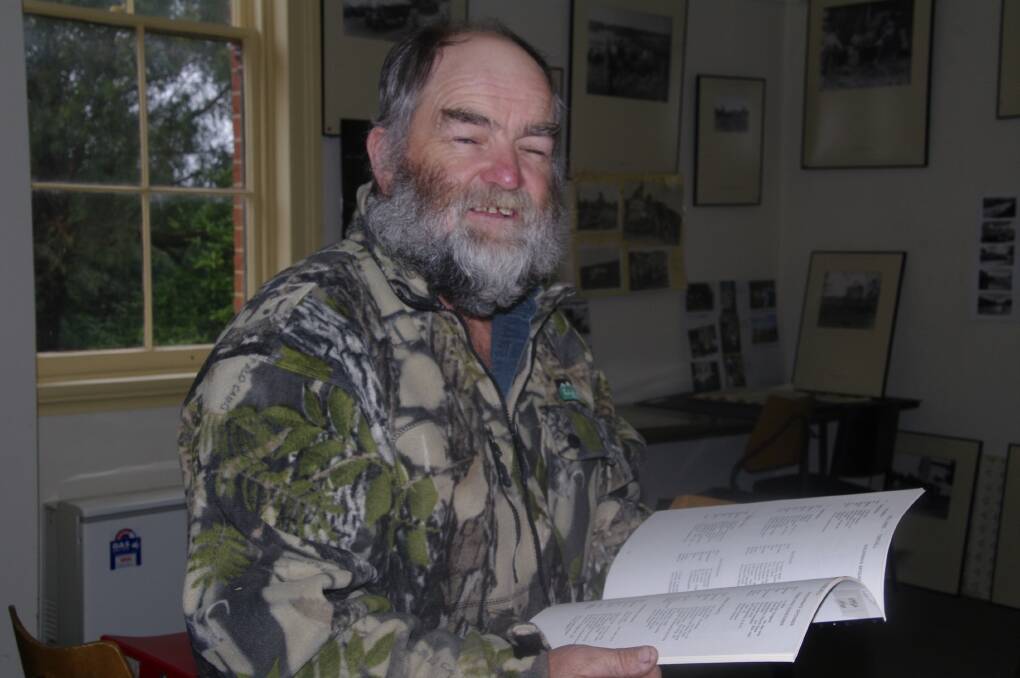 Rodney Rankin peruses some of the Bombala & District Historical Society's station records at Saturday's Open Day.