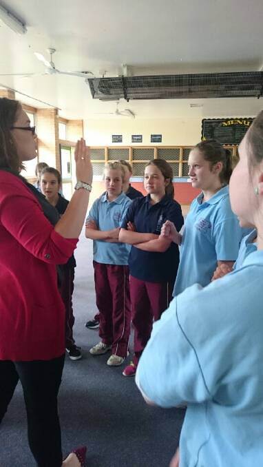 OFF TO HIGH SCHOOL: Year 6 Students playing drama games with Prac teacher Miss Hoff at Bombala High School Orientation Day.