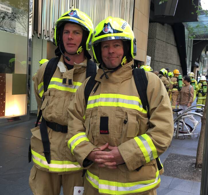 MND CLIMB: Bombala Fire and Rescue firefighters Malcolm Lavender and Gordon Anderson prepare to start the climb of the Sydney Tower Eye.