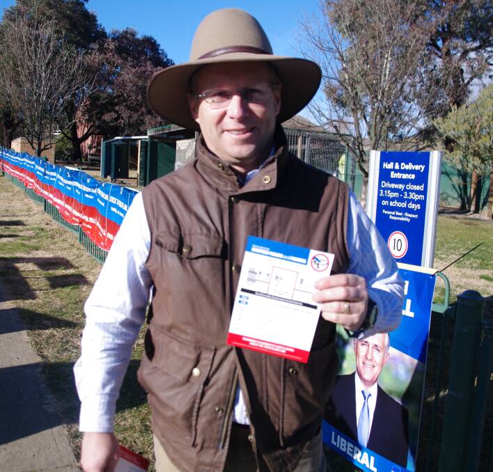 Mark Chapman was doing a grand job handing out how to vote material for Saturday's election at Bombala.