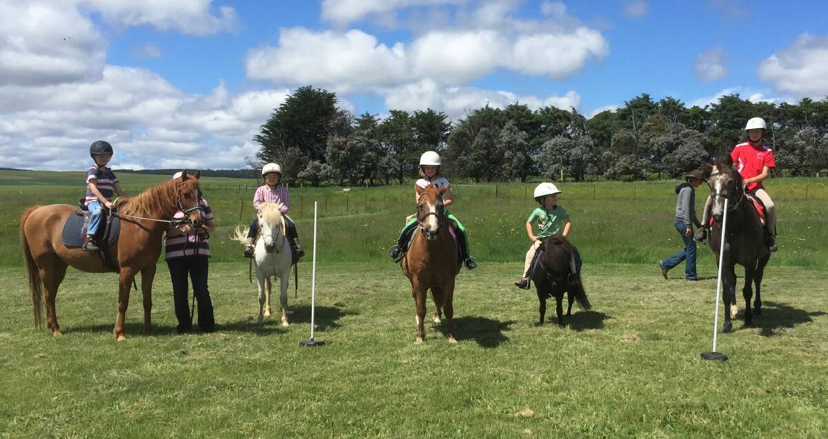 PONY CLUB RALLY: Delegate Pony Club riders Mitchell Reed, Ella French, Gabrielle Kidd, Aspen Cameron and Rochelle Voveris take their ponies through their moves.