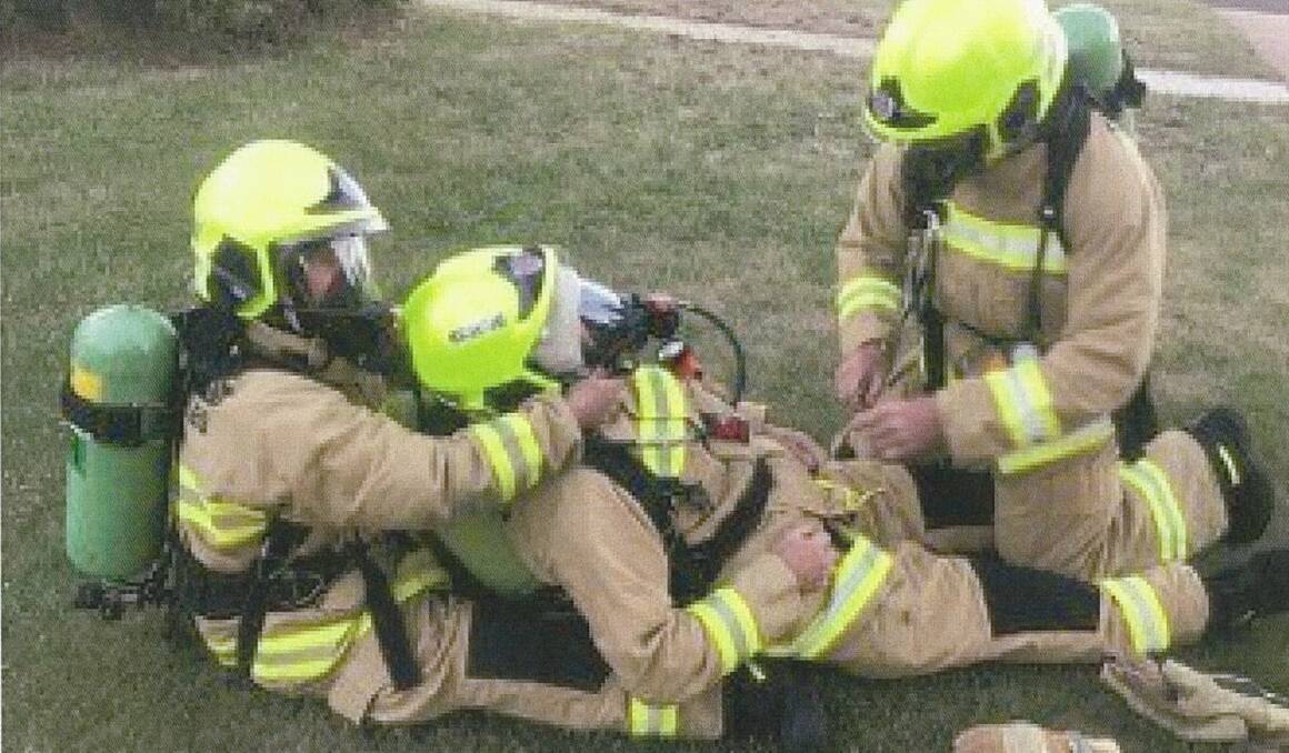 TRAINING: Bombala 230 firefighters performing a 'Mayday Drag" that is used to speed up the process of administering CPR to a fallen firefighter.