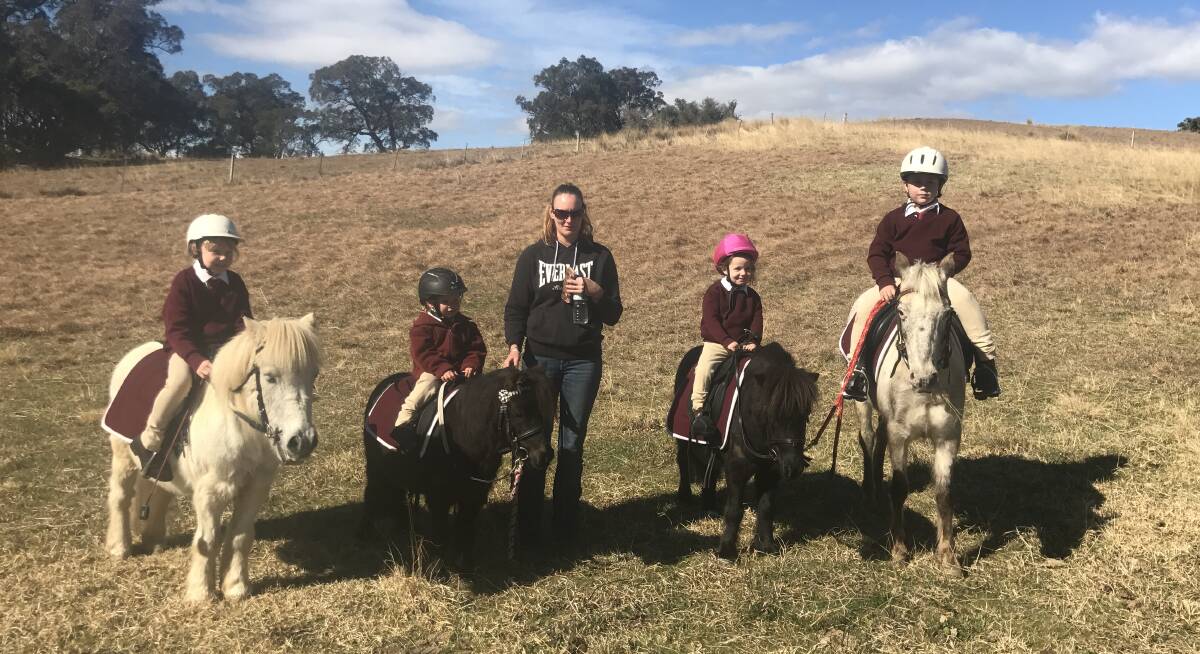Delegate Pony Clubbers Lydia Jamieson, Myah Voveris with her mum Kelly, Anna Cameron and Aspen Cameron at the Bemboka Gymkhana on Sunday.