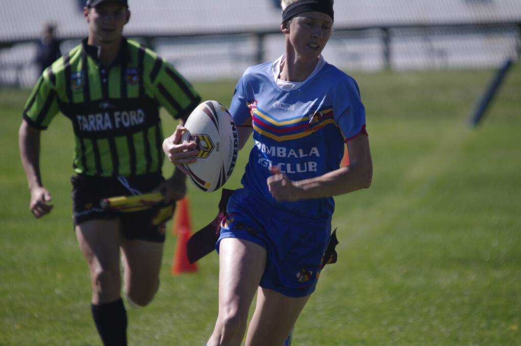 HIGH REGARD: Bombala High Heelers captain Patrice Clear makes a solid run with the ball during the game against the Bega Chicks in Bombala last weekend.