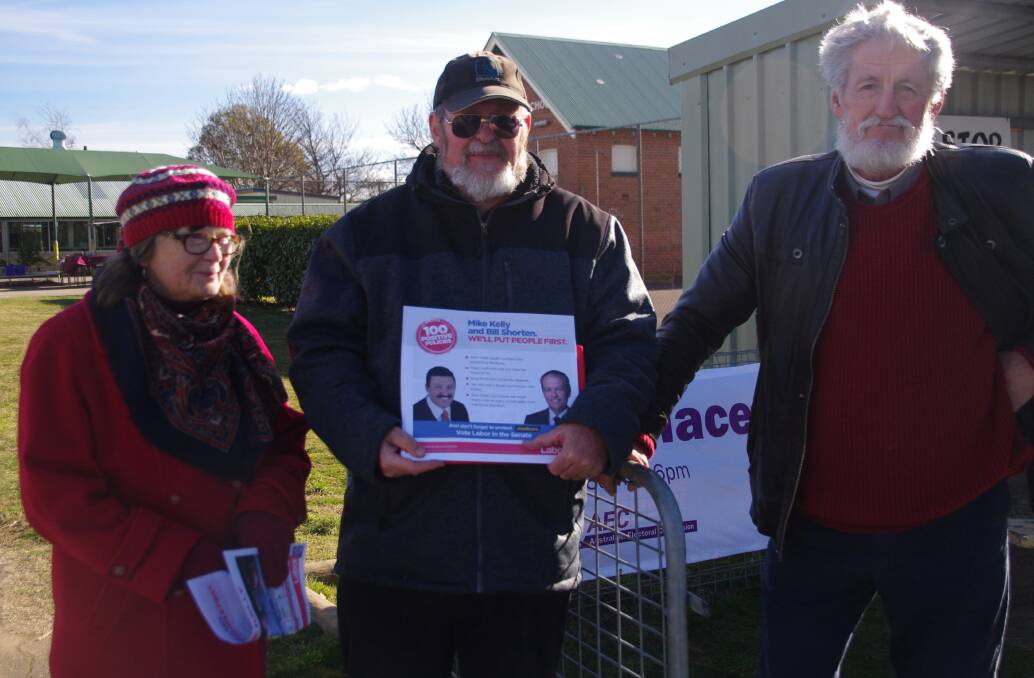 Delegate's Penelope Judge, Nigel Thompson and John Judge braved the cold conditions on Saturday to hand out how to vote material.