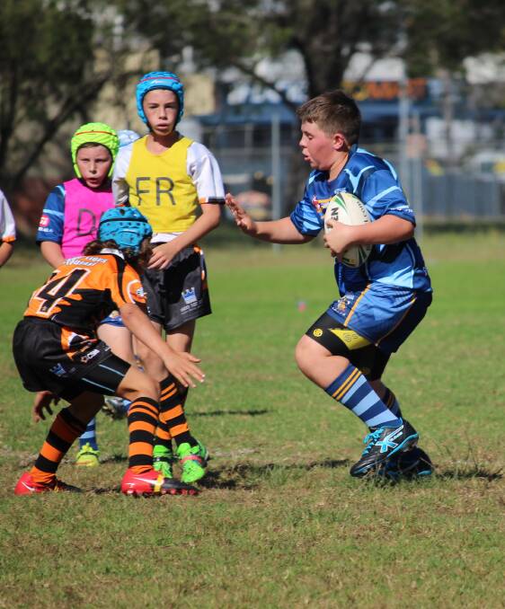 Bombala Blue Heeler junior rugby player Max Smith played a great defensive game in the U12s match against the Batemans Bay Tigers.