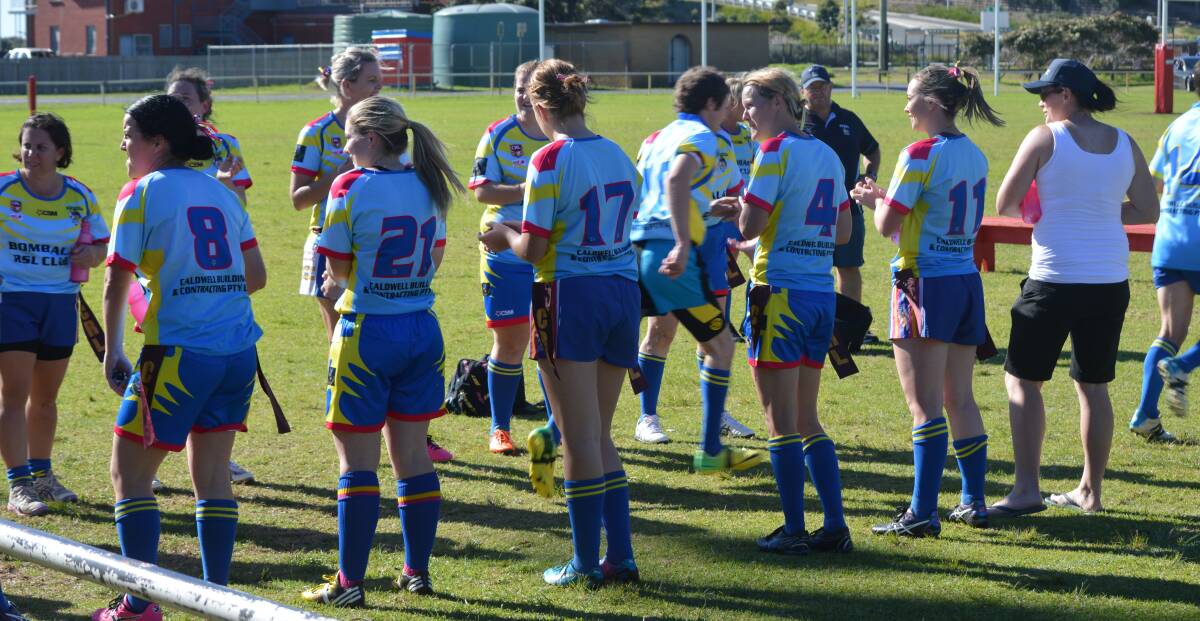 RUGBY LEAGUE: The Bombala High Heelers cheer the Bombala Blue Heelers Reserves onto the field playing against Narooma at Narooma on Sunday.