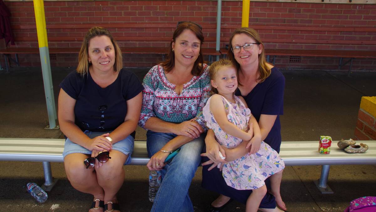 Emma Sullivan, Tracey Hampshire, Kellie Power and Charli Power at Bombala Public School's 'back to school' barbecue.
