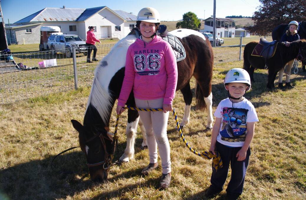 Courtney Harty and Dustin Voveris were really enjoying a day with their ponies at the Delegate Pony Club meet on Sunday.