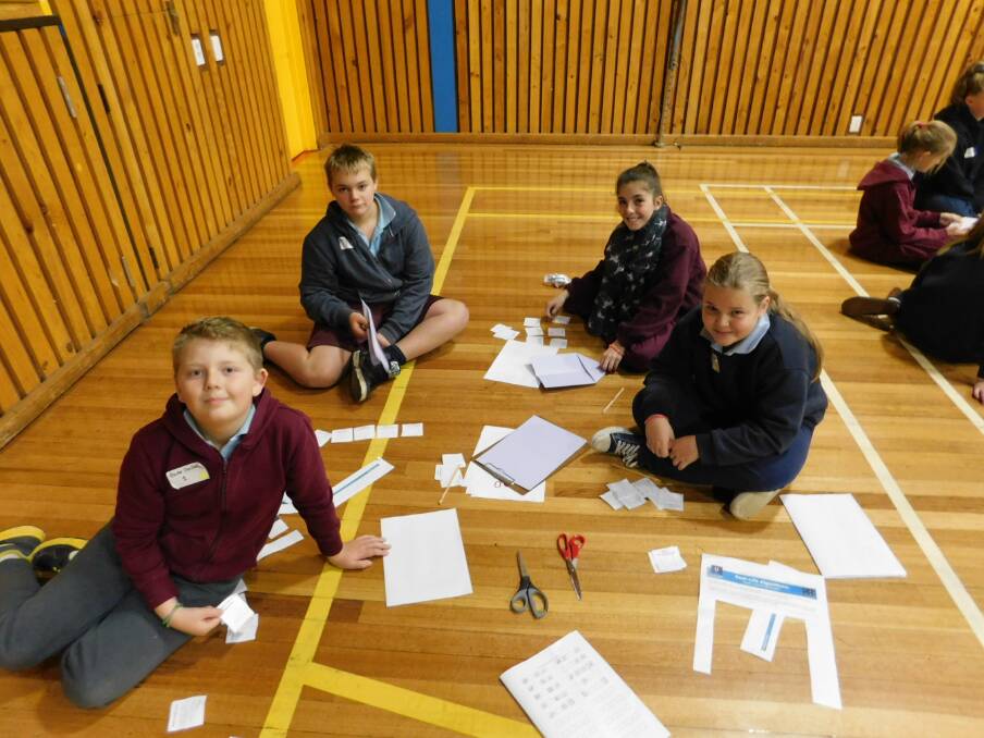 TECH HEADS: Blake Skellern, Rory Olding and Annie Green from Bombala Public School along with Charlie Campbell from St Joseph's Primary School.