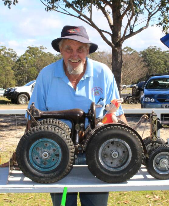 Harry Peadon of Bombala with the toy engines he builds from old Singer sewing machines attracted plenty of interest at the Pambula Motorfest.