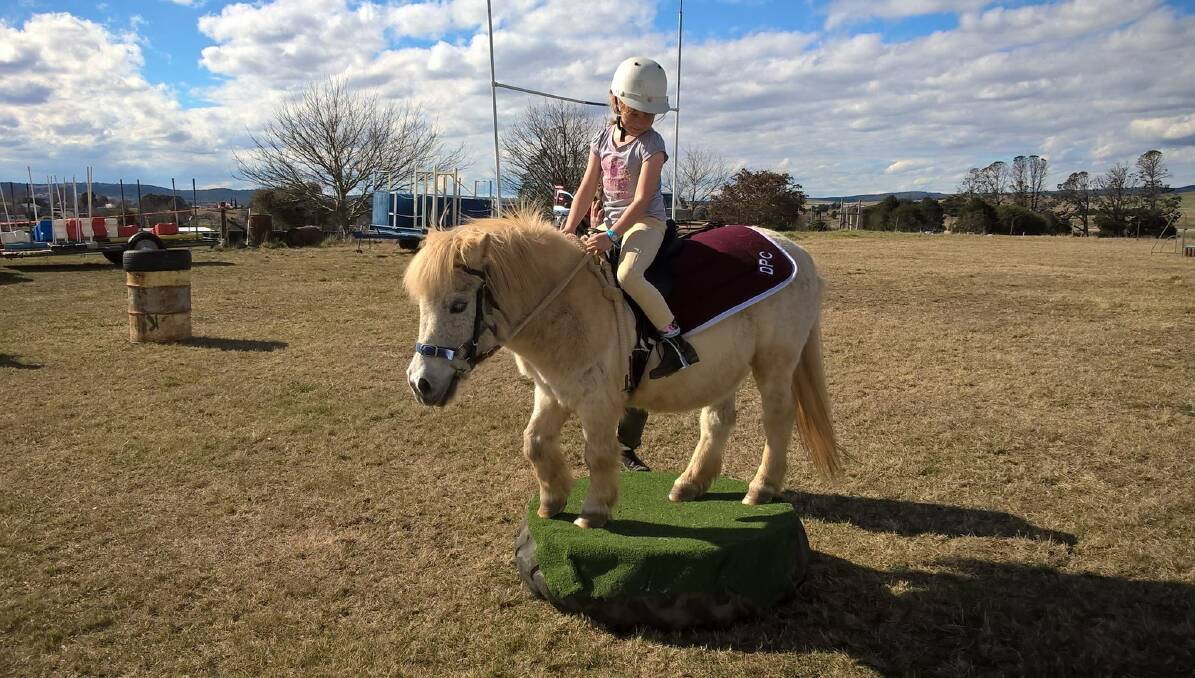 PONY RALLY: Delegate Pony Club member Lydia Jamieson practices for the forthcoming Delegate Pony Club gymkhana at Sunday's club rally.