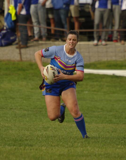 HIGH HEELERS:  Bombala High Heelers player Monique Perkins makes a strong run with the ball during the weekend game.