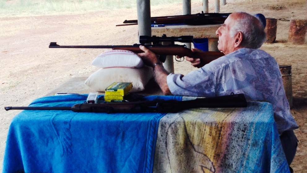 ANZAC SERVICE: Frank Koitka tries out a 22 Rimfire rifle during the Mount Isa Branch Sporting Shooters Association of Australia military competition in 2014.