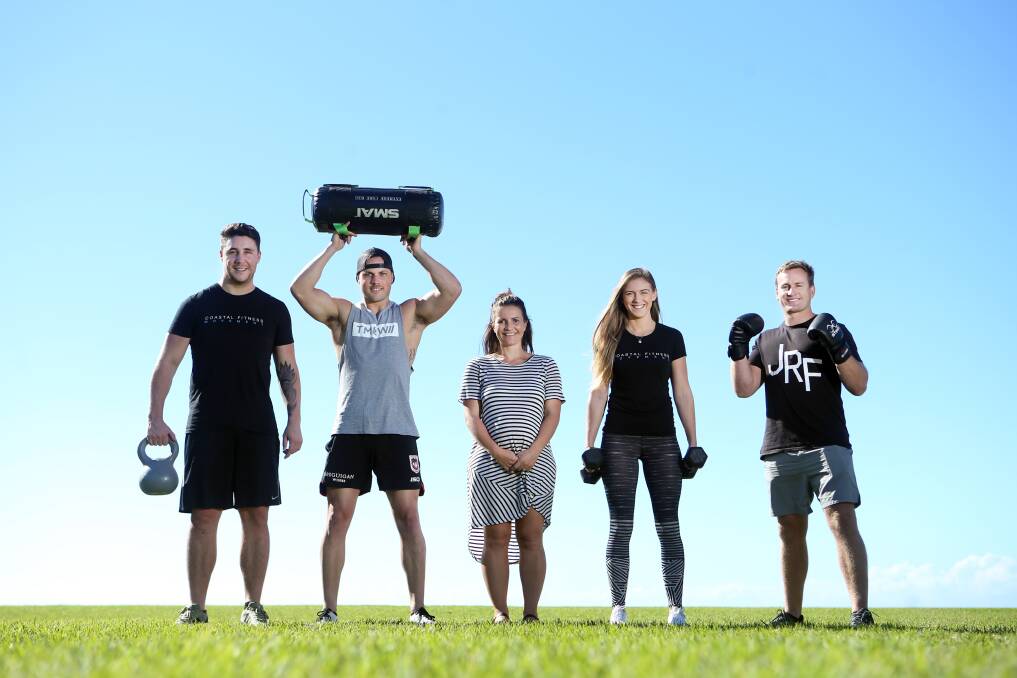 HEALTHY MOVEMENT: Courtney Beaton (middle) with trainers AJ Hatch, Tom Baker, Alyssa Warren and Joel Roberts who will be at the Healthy Livin Festival in Kiama. Picture: Sylvia Liber