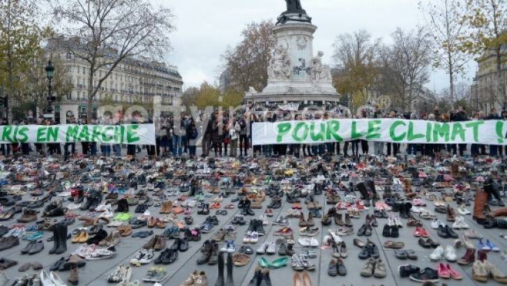 The Place de le Republique is covered with shoes representing the victims of the Paris terror attack during a rally ahead of climate talks. Photo: Aurelien Meunier