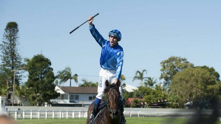 Jockey Nathan Berry celebrates his win on Unencumbered in the Magic Millions race day at the Gold Coast in January. Photo: Harrison Saragossi