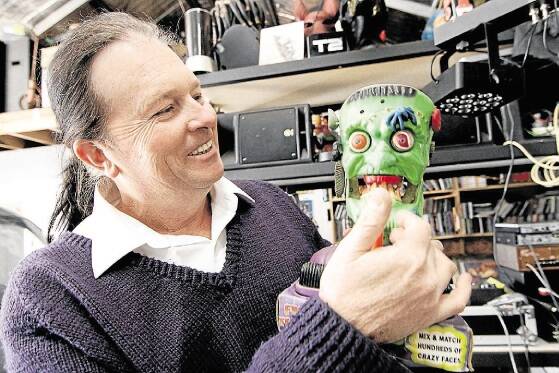 Collector Mark Damon of Devonport tests out the freaky features items in his collection.