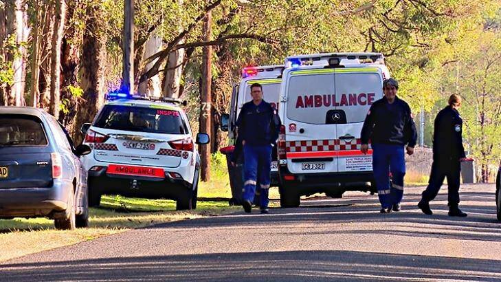 Ambulance paramedics at the property in Berkshire Park in Sydney's west where a bull attacked its owner  Photo: TNV NEWS
