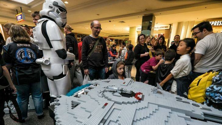 International Star Wars Day was celebrated a day early in Melbourne, with a group effort to build a massive Lego Millennium Falcon on Sunday. Photo: Luis Ascui
