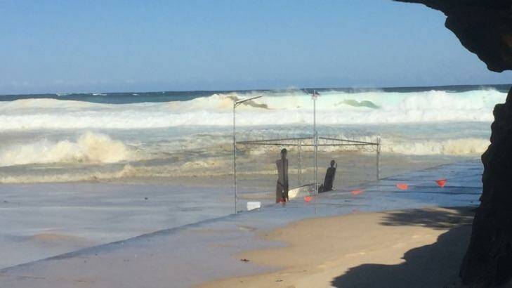 Large swell rolls towards the artwork 'Fair Dinkum Offshore Processing', which was destroyed. Photo: Danielle Smith
