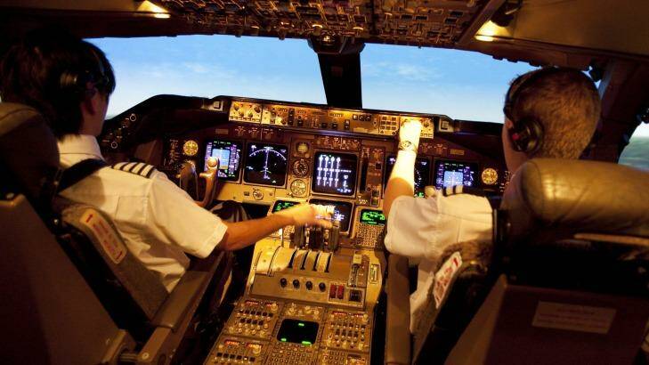 At the wheel: Pilots in a British Airways 747 simulator.
