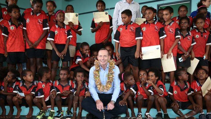 Tony Abbott joins students from Tagai State College on Mer Island. Photo: Alex Ellinghausen