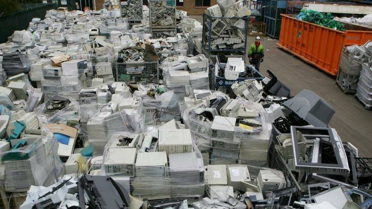 E-waste: masses of discarded computer and televisions at the recycling plant in Minto. Photo: Jenny Evans