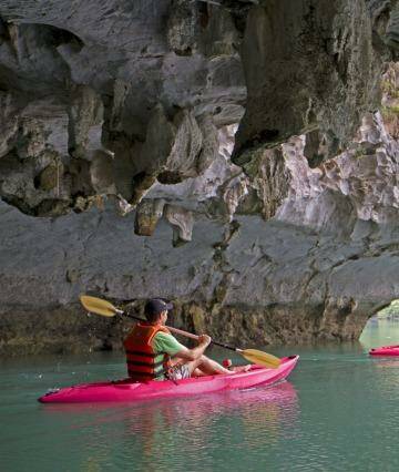 Wonder of the world: Kayaking through a
cave. Photo: Andrew Bain