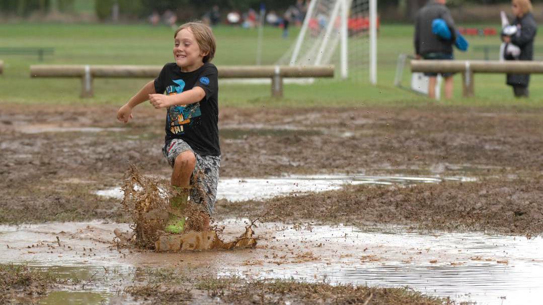 Young Dylan Tasker from Narooma thought the boggy car park at Proctor Park on Sunday was just right for a bit of fun, but it did make life difficult for the hordes of soccer fans who didn’t have a four-wheel drive.