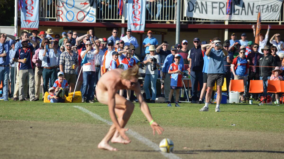 BALL BOY: The streaker at Dubbo's Blowes Clothing Cup grand finals. Photo: MATT FINDLAY