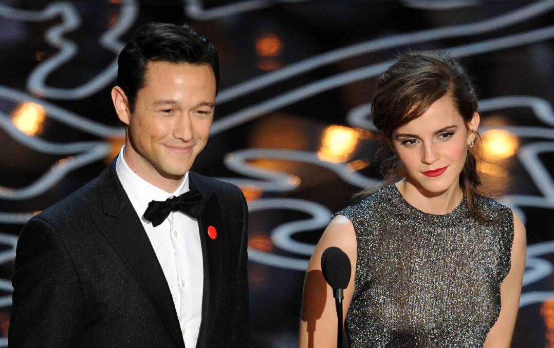 Actors Joseph Gordon-Levitt and Emma Watson speak onstage during the Oscars at the Dolby Theatre on March 2, 2014 in Hollywood Photo: GETTY IMAGES
