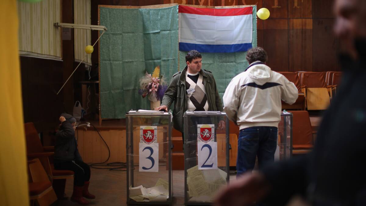 Crimean's went to the polls today in a vote that which will decide whether the peninsular will break away from mainland Ukraine. Photo: GETTY IMAGES