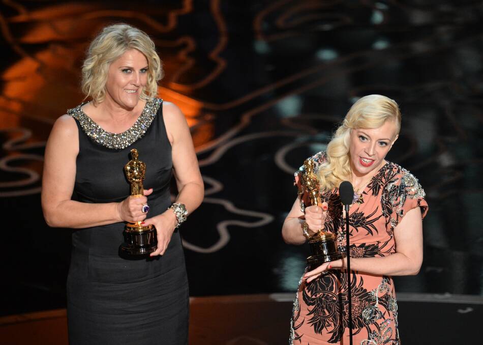 Production designers Beverley Dunn (L) and Catherine Martin accept the Best Achievement in Production Design award for 'The Great Gatsby' onstage during the Oscars at the Dolby Theatre on March 2, 2014 in Hollywood Photo: GETTY IMAGES