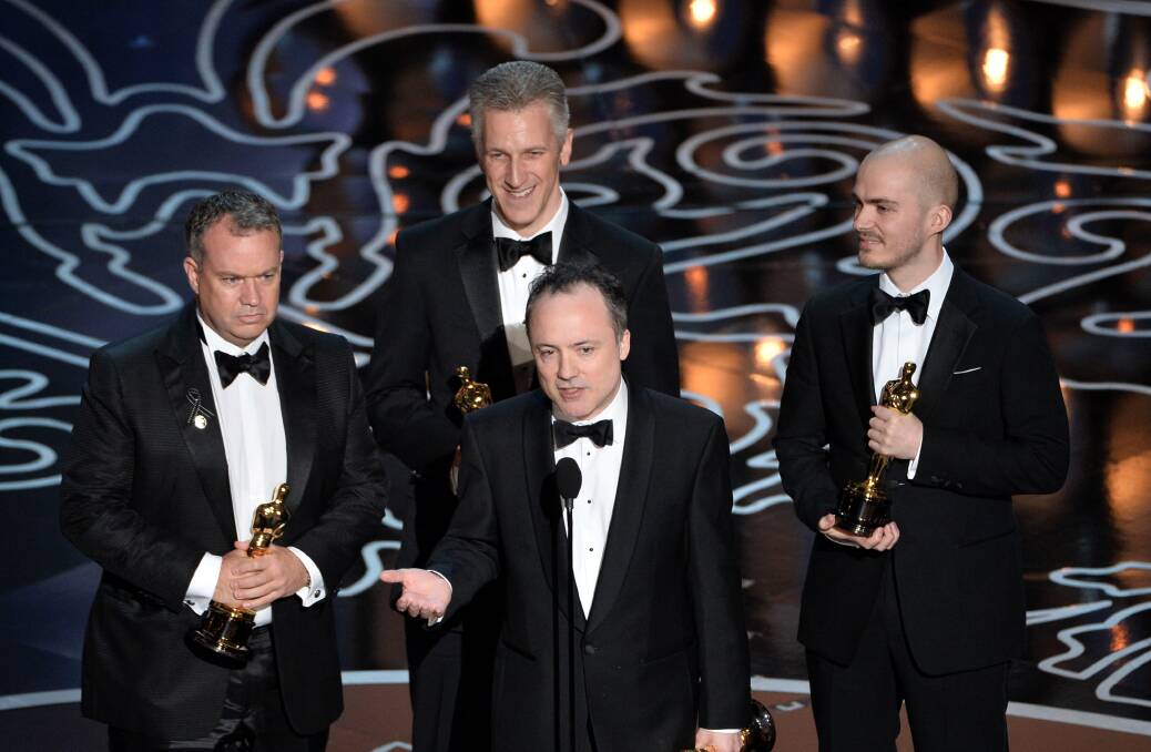 (L-R) Visual effects artists Neil Corbould, David Shirk, Timothy Webber, and Chris Lawrence accept the Best Achievement in Visual Effects award for 'Gravity' onstage during the Oscars at the Dolby Theatre on March 2, 2014 in Hollywood Photo: GETTY IMAGES